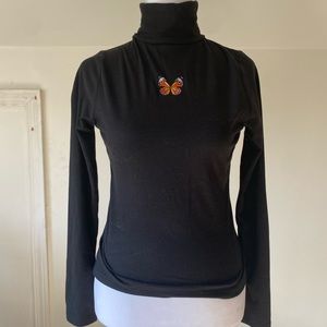 Black butterfly long sleeve turtle neck